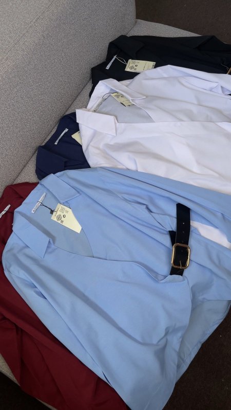 قميص مع قشاط قطعة وحدة
